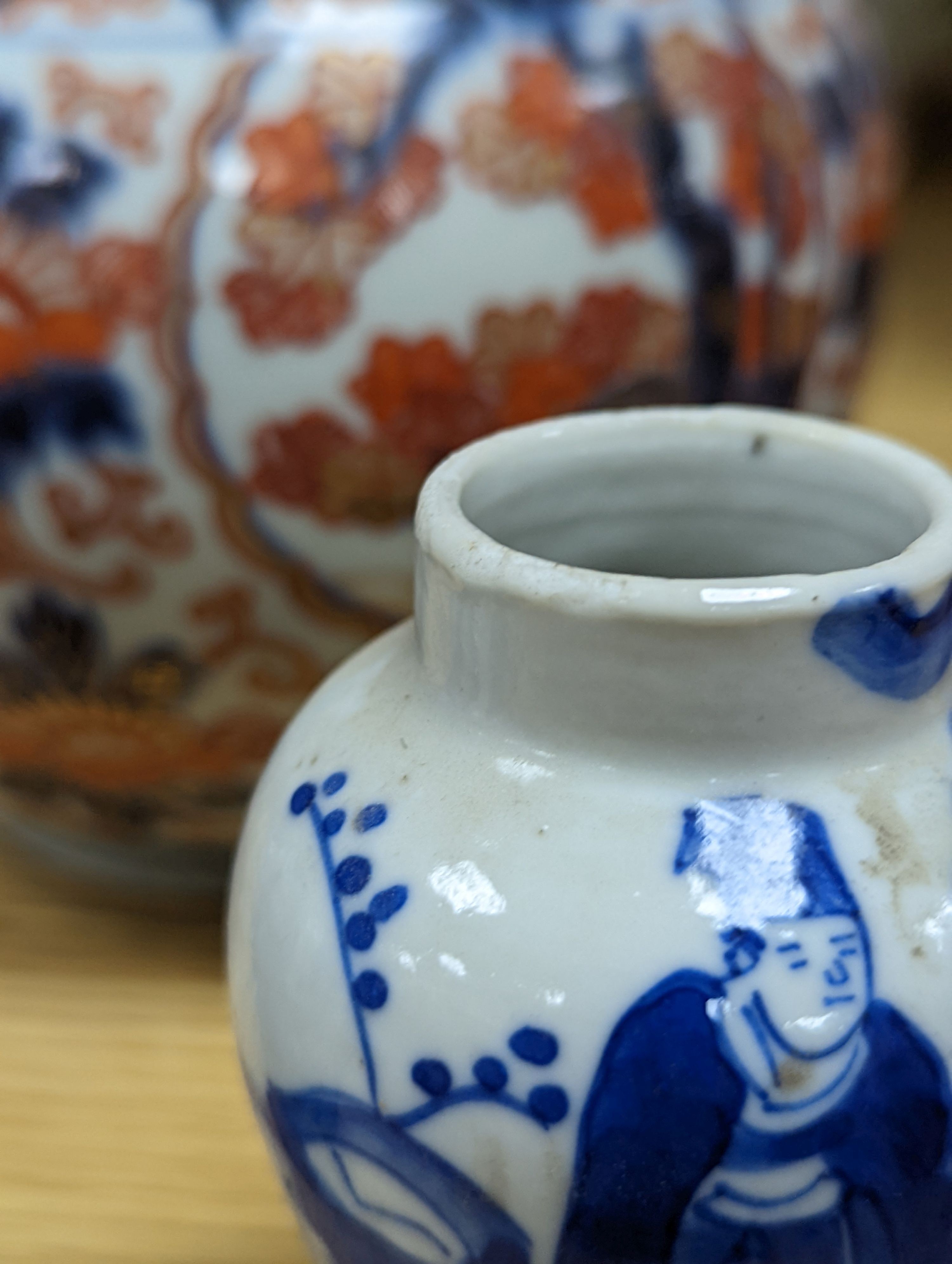 An 18th century Chinese famille rose dish, crackle-glaze stem cup, Beijing glass tea bowl and a Chinese Imari plate. Largest 24cm